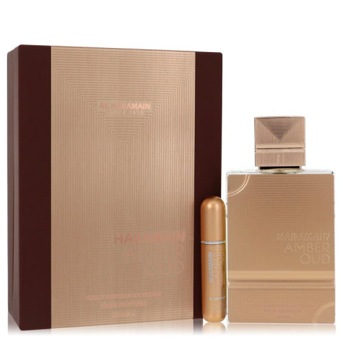 Al Haramain Amber Oud Gold Edition Extreme by Al HaramainGift Set 6.7 oz 6.7 Pure Perfume Spray + 0.34 oz Refillable Spray 6.7 oz / 200 ml