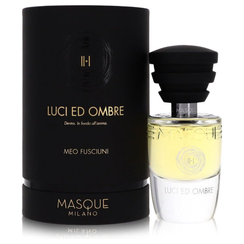 Luci Ed Ombre by Masque MilanoEau De Parfum Spray (Unisex) 1.18 oz 1.18 oz / 35 ml / Alcohol, Amber, Woody, Aldehyde, Oils Unisex