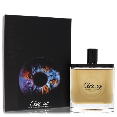 Olfactive Studio Close Up by Olfactive StudioEau De Parfum Spray (Unisex) 3.3 oz 3.3 oz / 100 ml / Alcohol, Amber, Woody, Aldehyde, Oils
